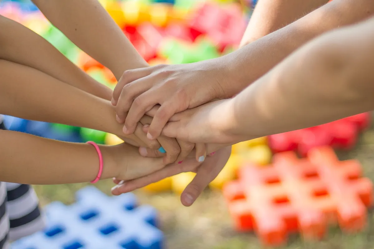 hands, friendship, friends, children, child, childhood, joined hands, touch, group, together, family, cooperation, cooperate, team, teamwork, help, support, tog