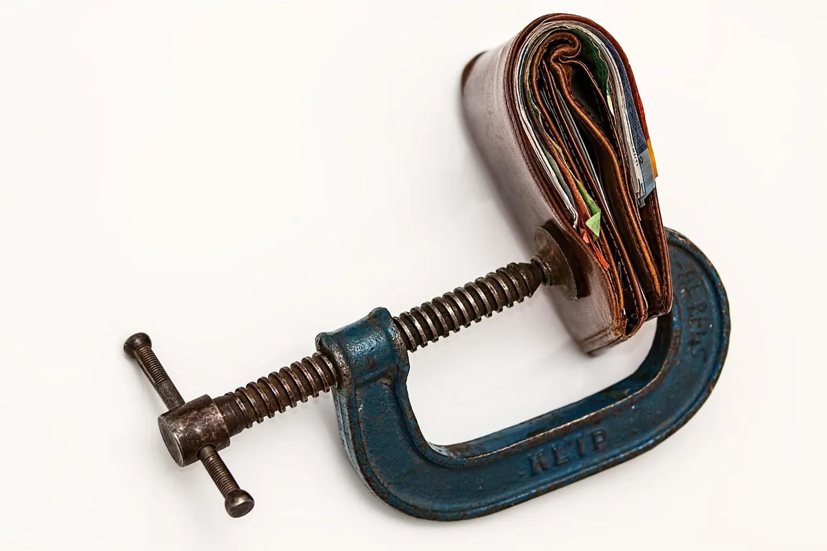 purse, money, credit squeeze, wallet, taxation, tax, economic stress, tight budget, consumerism, currency, inflation, financial difficulty, finance, cash, debt,